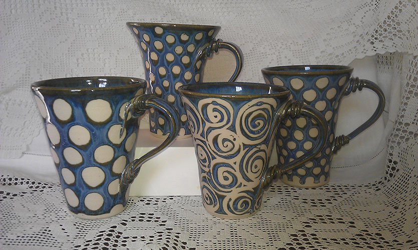 Ceramic mugs by Lois Thirkettle